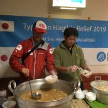 Preparing meals at the evacuation center.