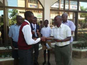 Awarding the Schalorships to Bright needy students