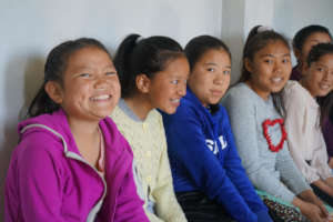 35 Happy girls with gift of education , now safe