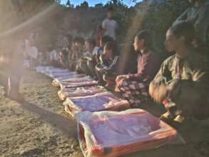 Distribution of tarpaulins, blankets, and foods