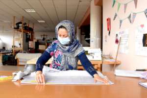 A talented seamstress in the Sewing Atelier