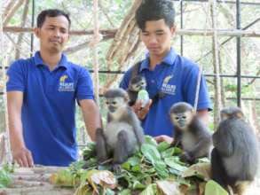 Keepers Vok and Sol with young douc troupe