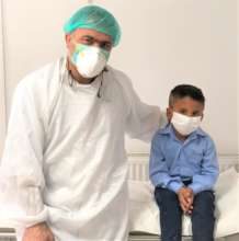 Dr Homayoon with Modasir after recovery