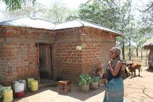 A happy homeowner with solar lighting.