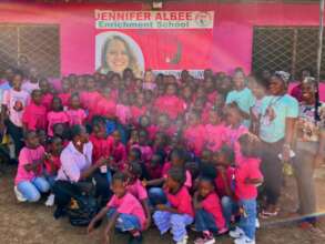 Jennifer with students and teachers.