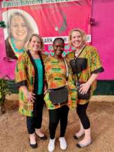 Proudly wearing clothes made by the girls
