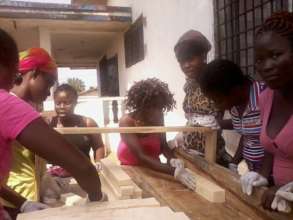 Students learning to make laundry soap