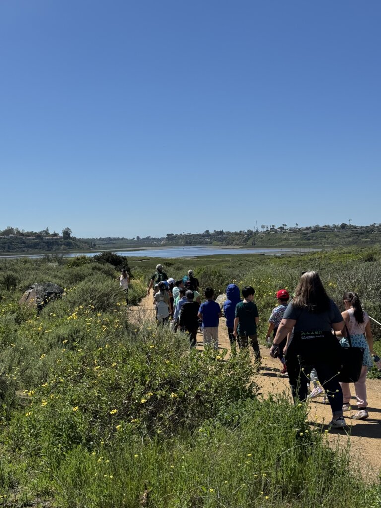 Students on the hiking trail at Upper Newport Bay.
