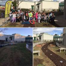 Families work together to create a school garden