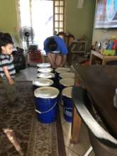 packing food buckets for elderly