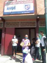 Giving bags: food, hygiene items & school supplies