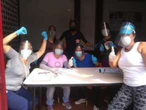 Delivery team using face mask & shields and gloves