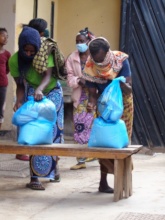 Mothers receiving food ration packages