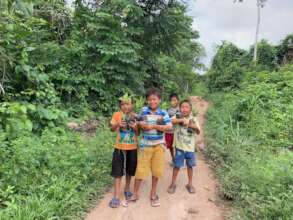 Family members helped distribute trees to plant.