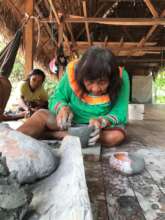 Our founding great grand mother teaching pottery.