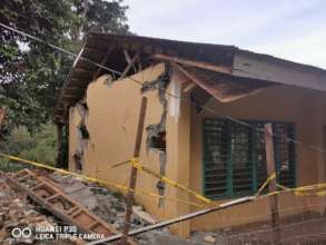 Severely destroyed building in Tulunan
