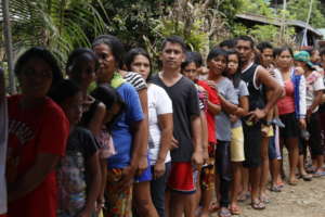 Families and victims of earthquake lining up
