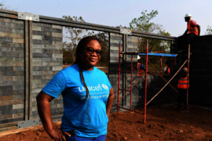 Sylviane, a UNICEF engineer, on site at a build