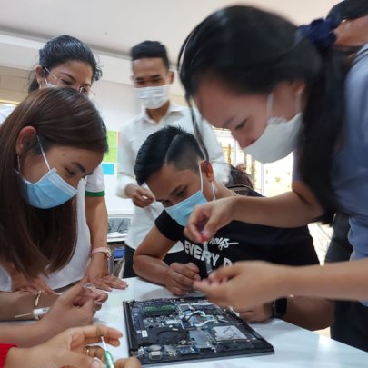 Students performing computer 'surgery'