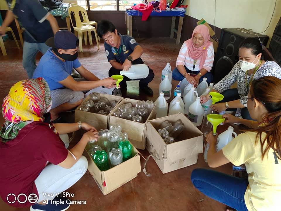 AAI Volunteers making care packages