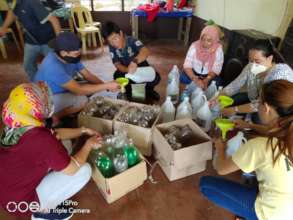AAI Volunteers making care packages