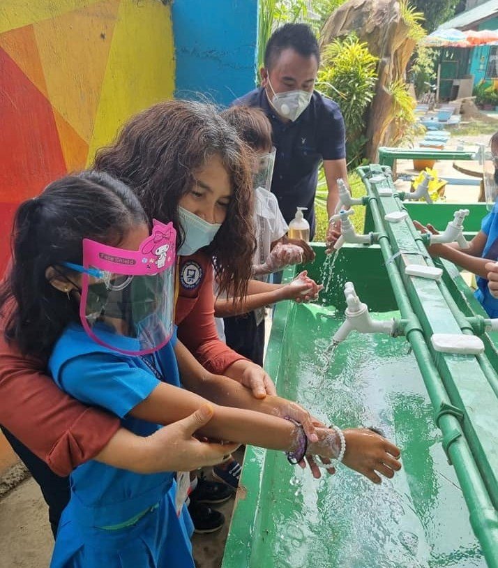 Teaching hygiene to kids at relief center