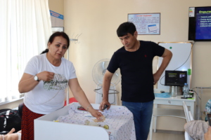 trainers showing the newborn resuscitation methods