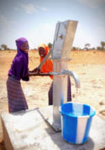 Girls at a well in the village of Tchamangal