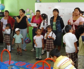Caretakers accompany their children at the center