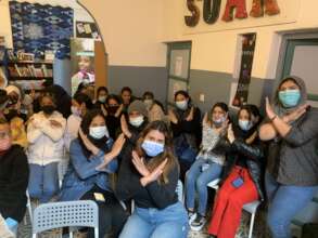 Soar Girls showing the Break the Bias X!