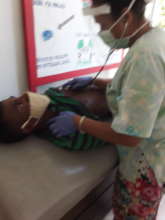 Dr. Elizabeth treating a patient
