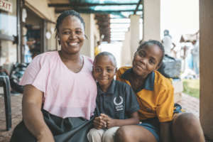 A field worker with her children