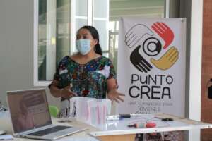 Veronica explains Punto Crea in Guatemala City