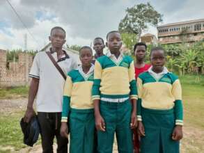 The 3 adolescents reporting to sch with caretakers