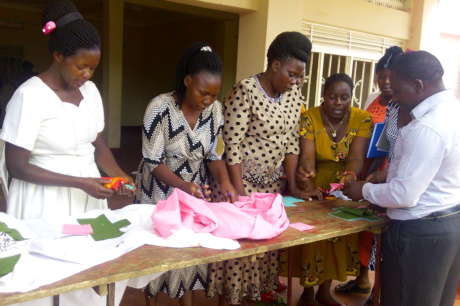 Train 100 men & 40 boys in Uganda on menstruation