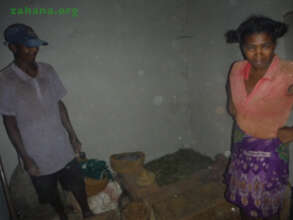 Mr Daha and his wife make cookstoves for sale
