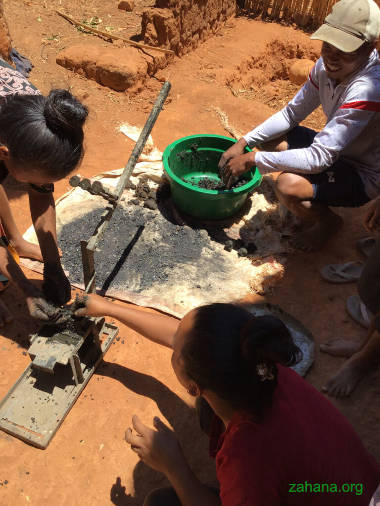 Making bio-charcoal is a family event