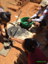 Making bio-charcoal is a family event