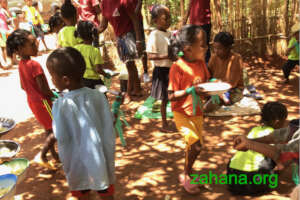 Sharing a celebratory meal cooked at the school