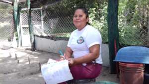 Female ranger Liessi recording nest data