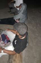 People waiting for turtles to nest to take eggs