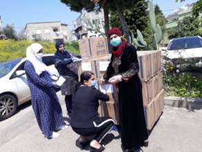 Grassroots women prepare packages of basic goods