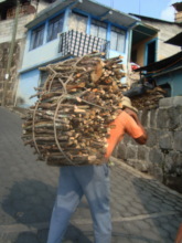 Every day women and men are carrying firewood