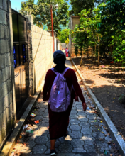 Candelaria on the streets of SA doing field visits