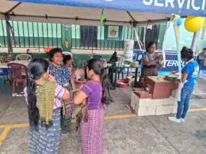 Isa sharing information about our ecostove program