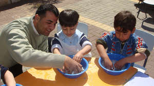 Ahmad helps children