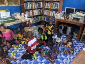 Children doing puzzles in the library this summer.