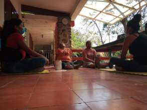 Family Mothers in Relaxing Yoga Session