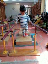 Walking exercise supported on bars.