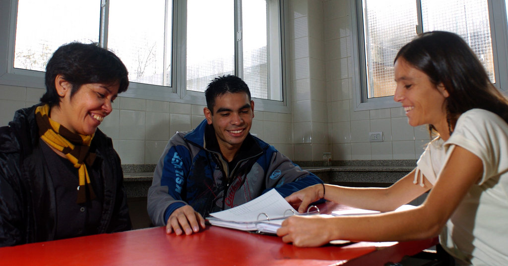 Carlos and his mother with Cimientos` mentor